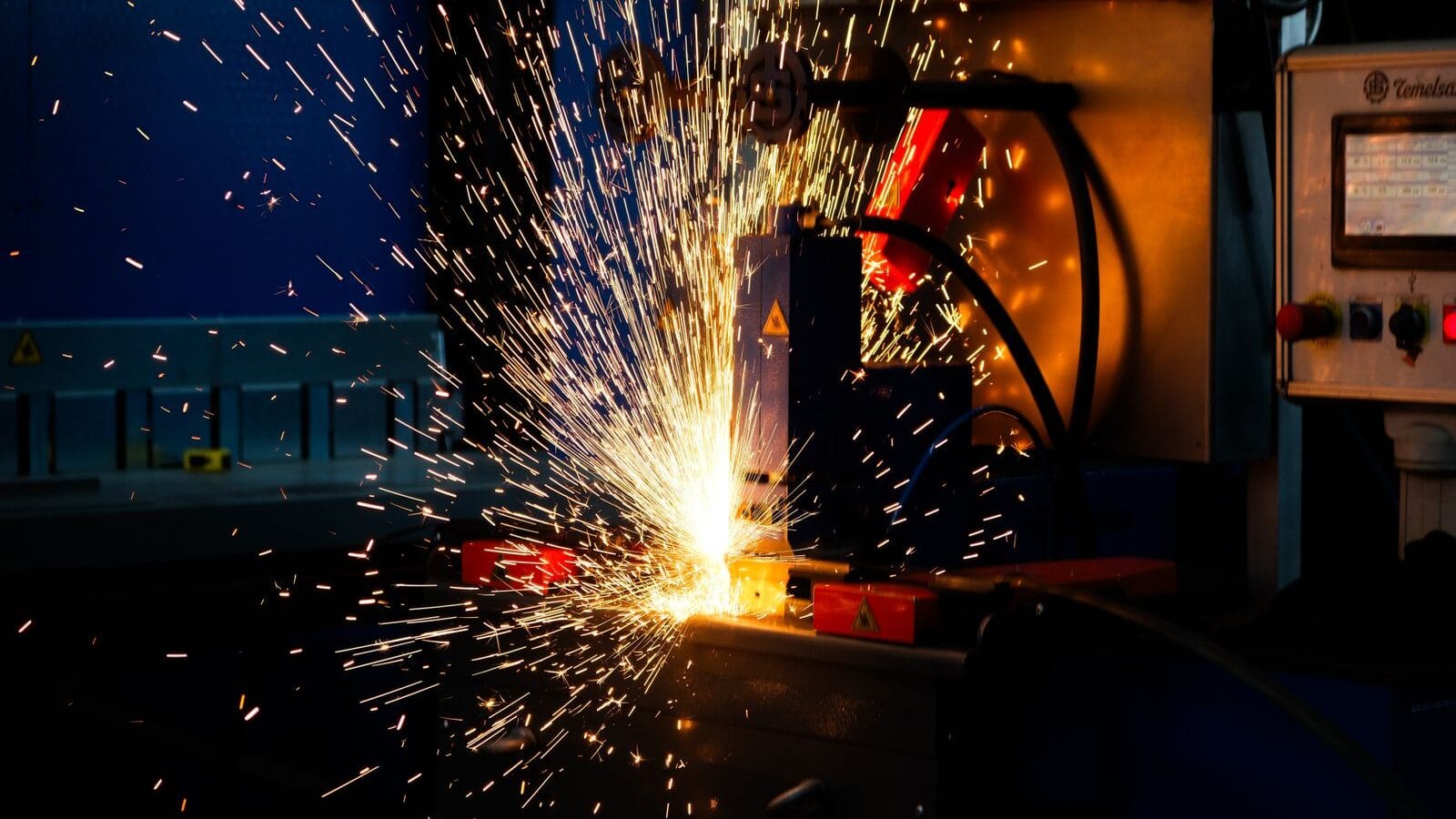 Welding sparks in an industrial manufacturing plant