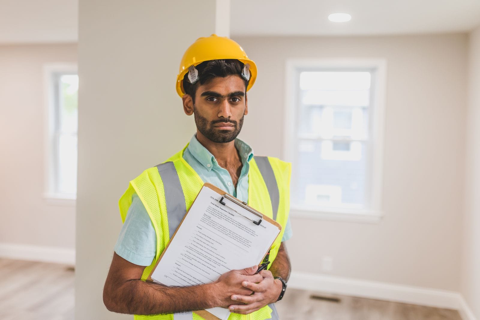 Specialist in hard hat and safety vest