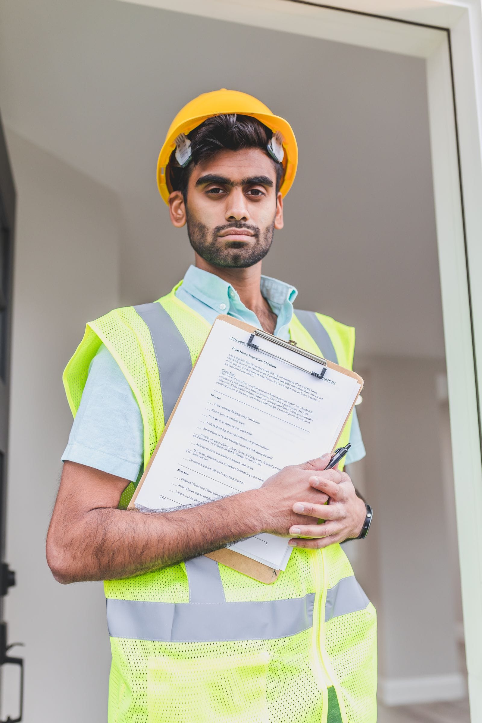 Engineer reviewing technical documents